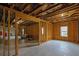 Unfinished basement with exposed framing, perfect for customization and expansion at 56 Addison Woods Dr, Sugar Hill, GA 30518
