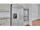 Gourmet kitchen features stainless steel appliances and granite countertops at 56 Addison Woods Dr, Sugar Hill, GA 30518