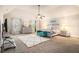 Spacious primary bedroom with vaulted ceiling, seating area, and neutral decor at 5925 Whitney Ct, Cumming, GA 30041