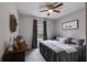 Bedroom with a ceiling fan, gray colored walls, carpet and curtains and a small window at 13 Westbrook Rd, Carrollton, GA 30116