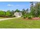 Exterior view of the home with a manicured front lawn and mature landscaping at 13 Westbrook Rd, Carrollton, GA 30116