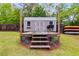 Backyard shed with deck and grilling area at 13 Westbrook Rd, Carrollton, GA 30116