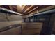 This basement features exposed pipes, concrete block walls, and a utility sink at 3692 Belmont Abbey Dr, Decatur, GA 30034