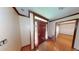 Welcoming foyer with wood door, hardwood floors, decorative trim, and natural light at 3692 Belmont Abbey Dr, Decatur, GA 30034