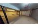 This garage features neutral walls, concrete floor, and two garage doors for vehicle storage at 3692 Belmont Abbey Dr, Decatur, GA 30034