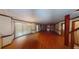 Spacious living room featuring hardwood floors, large windows, and a fireplace at 3692 Belmont Abbey Dr, Decatur, GA 30034