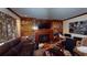 This living room features a fireplace, built-in bookshelves, and a TV, creating a cozy gathering space at 3692 Belmont Abbey Dr, Decatur, GA 30034