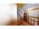 Carpeted stairway with wooden railing at 3692 Belmont Abbey Dr, Decatur, GA 30034