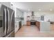Modern kitchen with stainless steel appliances, white cabinets, and light wood flooring at 2621 Gordon Se Cir, Smyrna, GA 30080