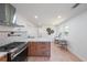 Bright kitchen with stainless appliances, kitchen island, dining nook, and modern decor at 2621 Gordon Se Cir, Smyrna, GA 30080