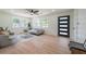 Bright living room with hardwood floors, a modern door and many windows at 2621 Gordon Se Cir, Smyrna, GA 30080