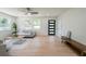 Spacious living room features hardwood floors, lots of natural light, and modern decor at 2621 Gordon Se Cir, Smyrna, GA 30080