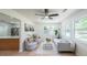 Living room with hardwood floors and neutral furniture; a view into the open kitchen at 2621 Gordon Se Cir, Smyrna, GA 30080