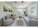 Bright living room with wood floors, neutral furniture, and natural light at 2621 Gordon Se Cir, Smyrna, GA 30080