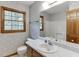 Cozy bathroom with a vanity and window, a space ready to be personalized at 859 Sangria Ct, Lawrenceville, GA 30043