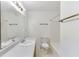 Clean bathroom featuring a vanity, mirror, and bathtub-shower combination, offering a functional and tidy space at 859 Sangria Ct, Lawrenceville, GA 30043