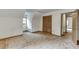 A spacious bedroom features neutral walls, closet, and entry to additional room at 859 Sangria Ct, Lawrenceville, GA 30043
