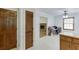 Bright dining area featuring a stone fireplace visible through an open doorway at 859 Sangria Ct, Lawrenceville, GA 30043