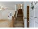 Entryway with staircase leading to the second floor and views into the living spaces at 859 Sangria Ct, Lawrenceville, GA 30043