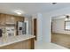 Traditional kitchen featuring wood cabinets and stainless steel appliances at 859 Sangria Ct, Lawrenceville, GA 30043
