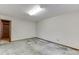 Unfinished room ready for updates with light walls and window at 859 Sangria Ct, Lawrenceville, GA 30043