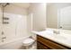 Clean bathroom with a shower-tub combination and a vanity with a dark wood finish at 1021 Reddy Farm Rd, Grayson, GA 30017