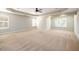 Spacious bedroom with lots of natural light and neutral colored walls at 1021 Reddy Farm Rd, Grayson, GA 30017