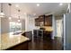 Well-equipped kitchen with island, stainless steel appliances, and granite counters at 1021 Reddy Farm Rd, Grayson, GA 30017
