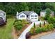Aerial view of a house with a beautifully landscaped front yard at 2111 Yorkshire Ct, Woodstock, GA 30189