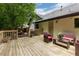 Back deck overlooks backyard with mature trees and shade at 2111 Yorkshire Ct, Woodstock, GA 30189