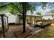 A brick patio and wood deck create a cozy outdoor space at 2111 Yorkshire Ct, Woodstock, GA 30189