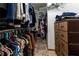 Walk-in closet with an organization system for storing clothing and accessories at 2111 Yorkshire Ct, Woodstock, GA 30189