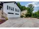 Home with a spacious driveway and attached two-car garage at 2111 Yorkshire Ct, Woodstock, GA 30189