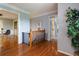 Hallway with hardwood flooring, modern paint color and easy access to living spaces at 2111 Yorkshire Ct, Woodstock, GA 30189