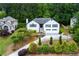 Charming home with manicured landscaping and a two-car garage at 2111 Yorkshire Ct, Woodstock, GA 30189