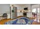 Modern kitchen includes stainless steel appliances, white cabinets, hardwood floors, and breakfast nook at 2111 Yorkshire Ct, Woodstock, GA 30189