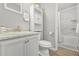 Bathroom with shower and tub combination, toilet, and vanity at 2959 Pritchards Mill Trl, Douglasville, GA 30135