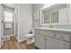 Bathroom with neutral walls, vanity, mirror, and toilet at 2959 Pritchards Mill Trl, Douglasville, GA 30135