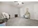 Bedroom with a ceiling fan, neutral carpet, and grey walls at 2959 Pritchards Mill Trl, Douglasville, GA 30135