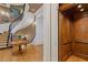 Foyer featuring wood elevator and staircase with black iron railing at 3977 Sweet Bottom Dr, Duluth, GA 30096