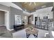Bright, open layout connecting living room to kitchen with modern finishes and city views at 855 Peachtree Ne St # 1703, Atlanta, GA 30308