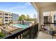 Balcony view overlooking a community pool and sunbathing area, perfect for relaxation at 870 Inman Village Ne Pkwy # 305, Atlanta, GA 30307