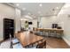 Bright community room features a large table, bar seating, and a cozy lounge area for gathering at 870 Inman Village Ne Pkwy # 305, Atlanta, GA 30307