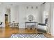 Well-designed living space with a chair, table and stools, hardwood floors, and modern decor at 870 Inman Village Ne Pkwy # 305, Atlanta, GA 30307