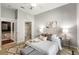 Inviting main bedroom featuring a walk-in closet, a relaxing bath, and serene decor elements at 870 Inman Village Ne Pkwy # 305, Atlanta, GA 30307