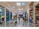Bright indoor shopping mall with overhead blue lights and a variety of shopping and dining options at 1062 Grant Terrace, Atlanta, GA 30315