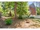 A lush backyard with mature trees and plenty of space to relax at 4259 Kings Troop Rd, Stone Mountain, GA 30083