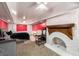 Finished basement offers a cozy bedroom, fireplace, and built-in storage at 4259 Kings Troop Rd, Stone Mountain, GA 30083