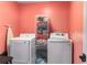 Laundry room with washer, dryer and ample storage at 4259 Kings Troop Rd, Stone Mountain, GA 30083