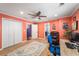 Well-lit office space with wood floors, bright walls, natural light, and dual workspaces at 4259 Kings Troop Rd, Stone Mountain, GA 30083